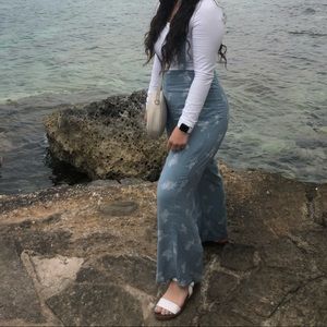 Blue suspender pants with white flowers